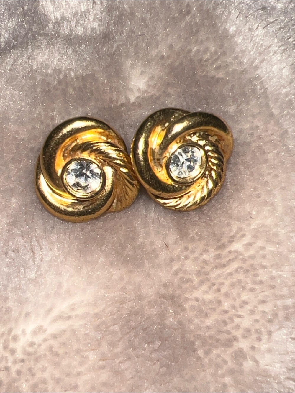 Avon Vintage gold love knot Stud Earrings with rhinestone accent.